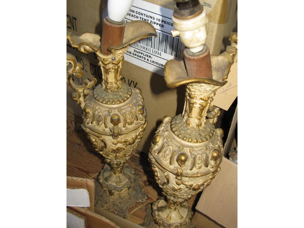 Appraisal: A pair of cast metal ewers in renaissance style in