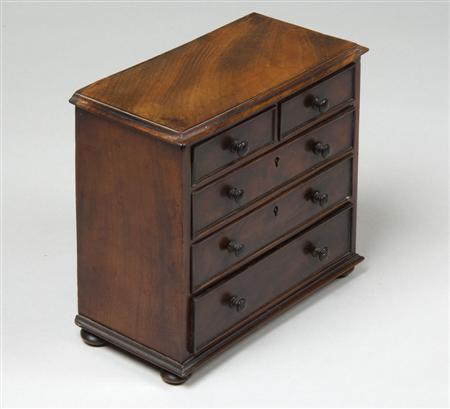 Appraisal: A Victorian mahogany miniature chest of drawers late th century