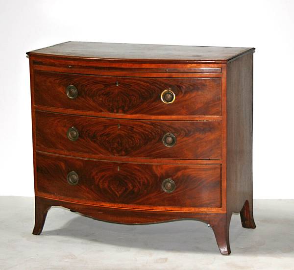 Appraisal: A late George III mahogany and satinwood bow front chest