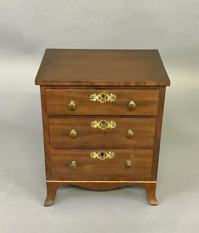 Appraisal: Miniature Hepplewhite Cherry Three-Drawer Chest Miniature Hepplewhite cherry three-drawer chest