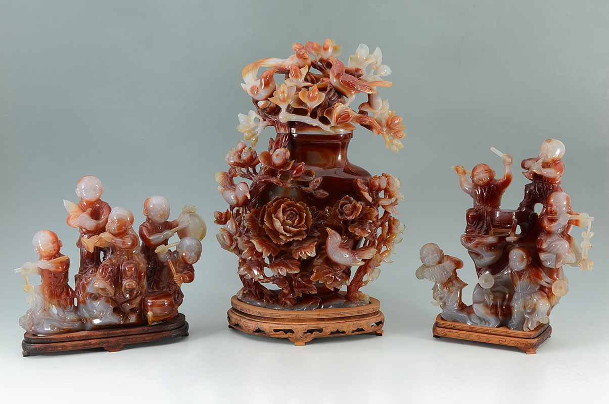 Appraisal: LARGE CARVED CARNELIAN AGATE SCULPTURES Chinese carved carnelian agate or