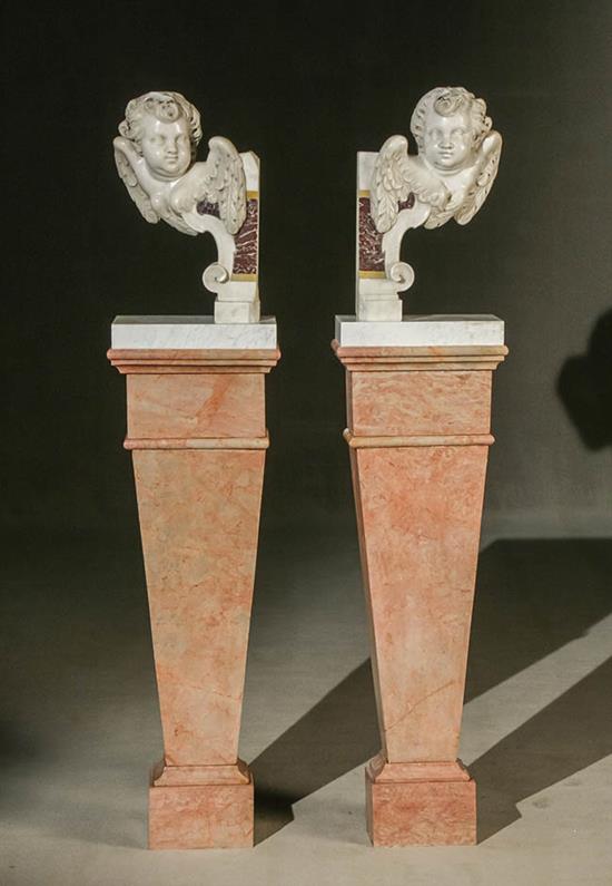 Appraisal: Pair of Italian White Lavender and Gold Veneered Marble Putti