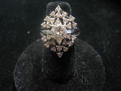 Appraisal: Platinum and diamond engagement ring th century Set with a