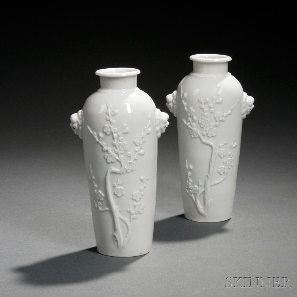 Appraisal: Two Blanc-de-Chine Vases China Qing Dynasty the cylindrical vases decorated