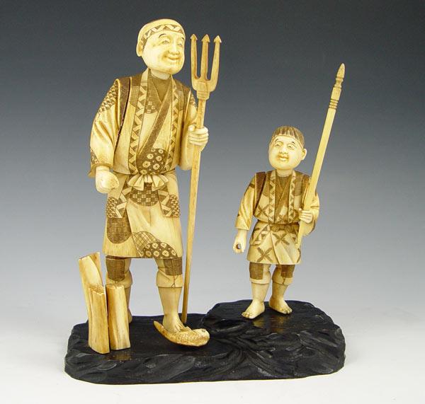 Appraisal: JAPANESE CARVED IVORY FATHER SON FISHERMEN Scene of father and