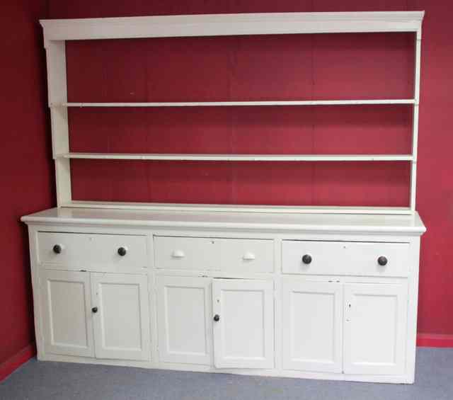 Appraisal: A Victorian white painted pine dresser with shelves over fitted