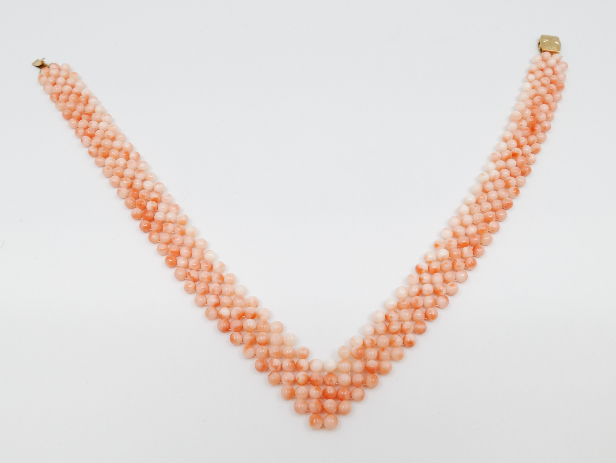 Appraisal: Pink Coral Multi-Bead V Necklace- ''