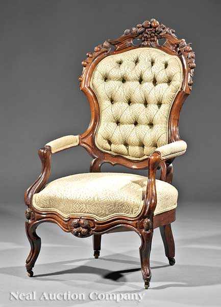 Appraisal: An American Rococo Carved Rosewood Armchair mid- th c carved