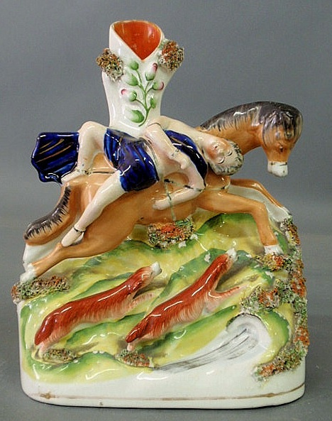 Appraisal: Staffordshire figural group spill vase of Mazeppa bound to a