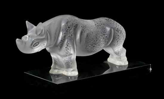 Appraisal: A Lalique Molded and Frosted Glass Sculpture depicting a rhinoceros