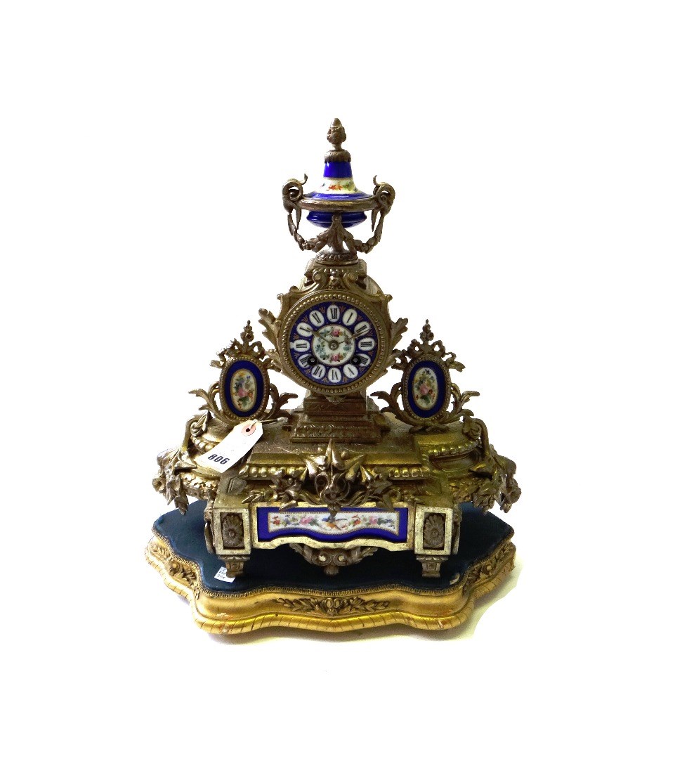 Appraisal: A Continental gilt metal and porcelain mounted mantel clock early