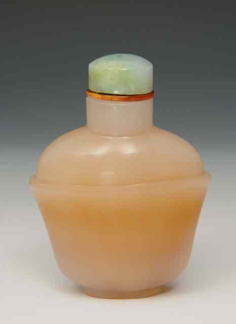 Appraisal: A CHINESE PALE CHALCEDONY SNUFF BOTTLE with ribbed shoulder design