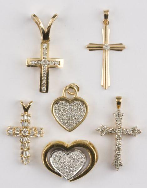 Appraisal: Six Gold and Diamond Items three KT yellow gold crosses