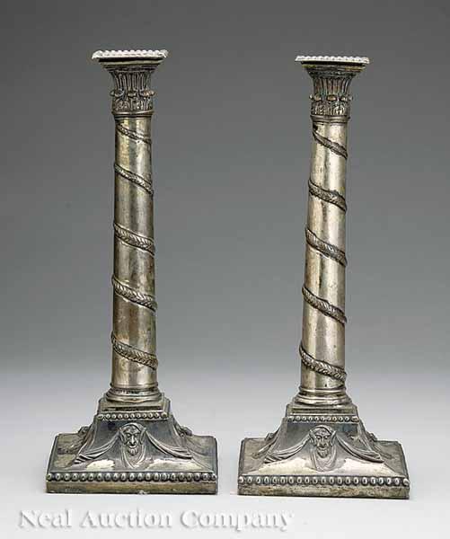 Appraisal: A Pair of Antique Sheffield Plate Candlesticks th c columnar