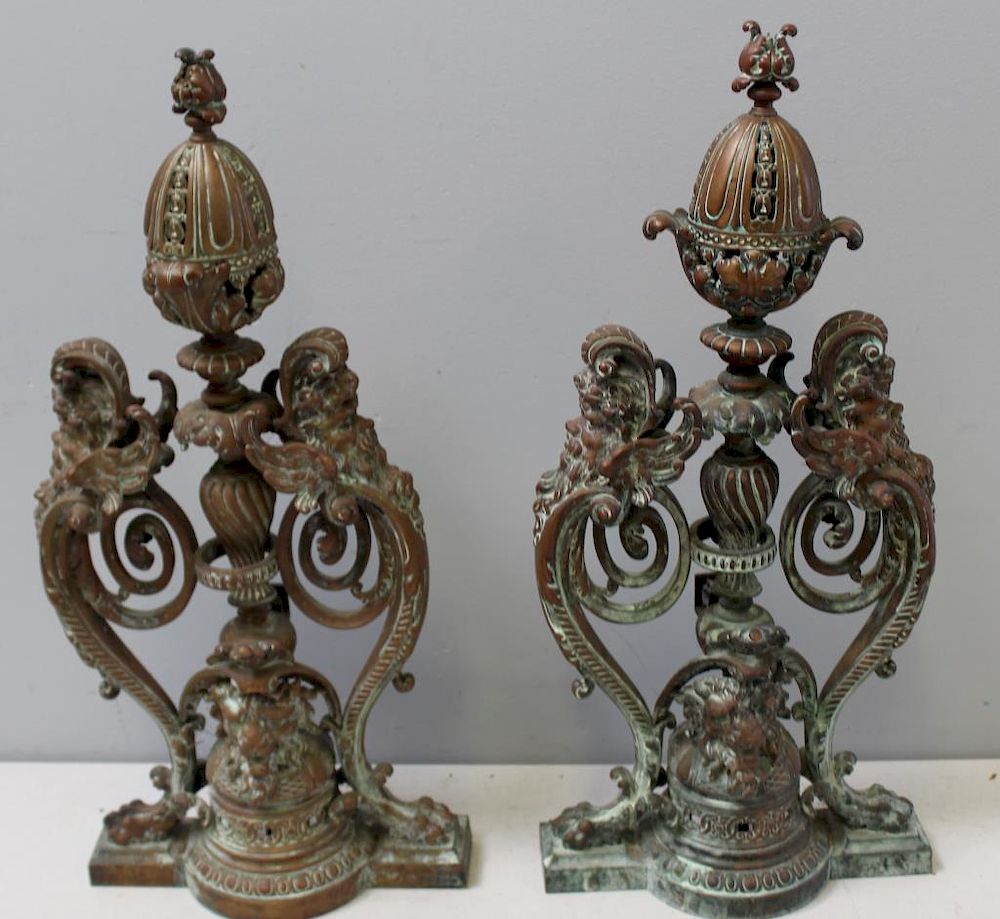 Appraisal: Pair Of Century Brass Andirons with Neptune Decoration Nice size