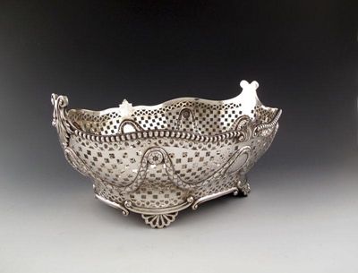 Appraisal: An Edwardian silver basket by Charles Stuart Harris London shaped