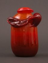 Appraisal: Biomorphic Red Glass Vase This biomorphic glass vase is made