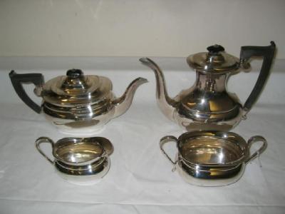 Appraisal: A FOUR PIECE TEA AND COFFEE SET of rounded oblong