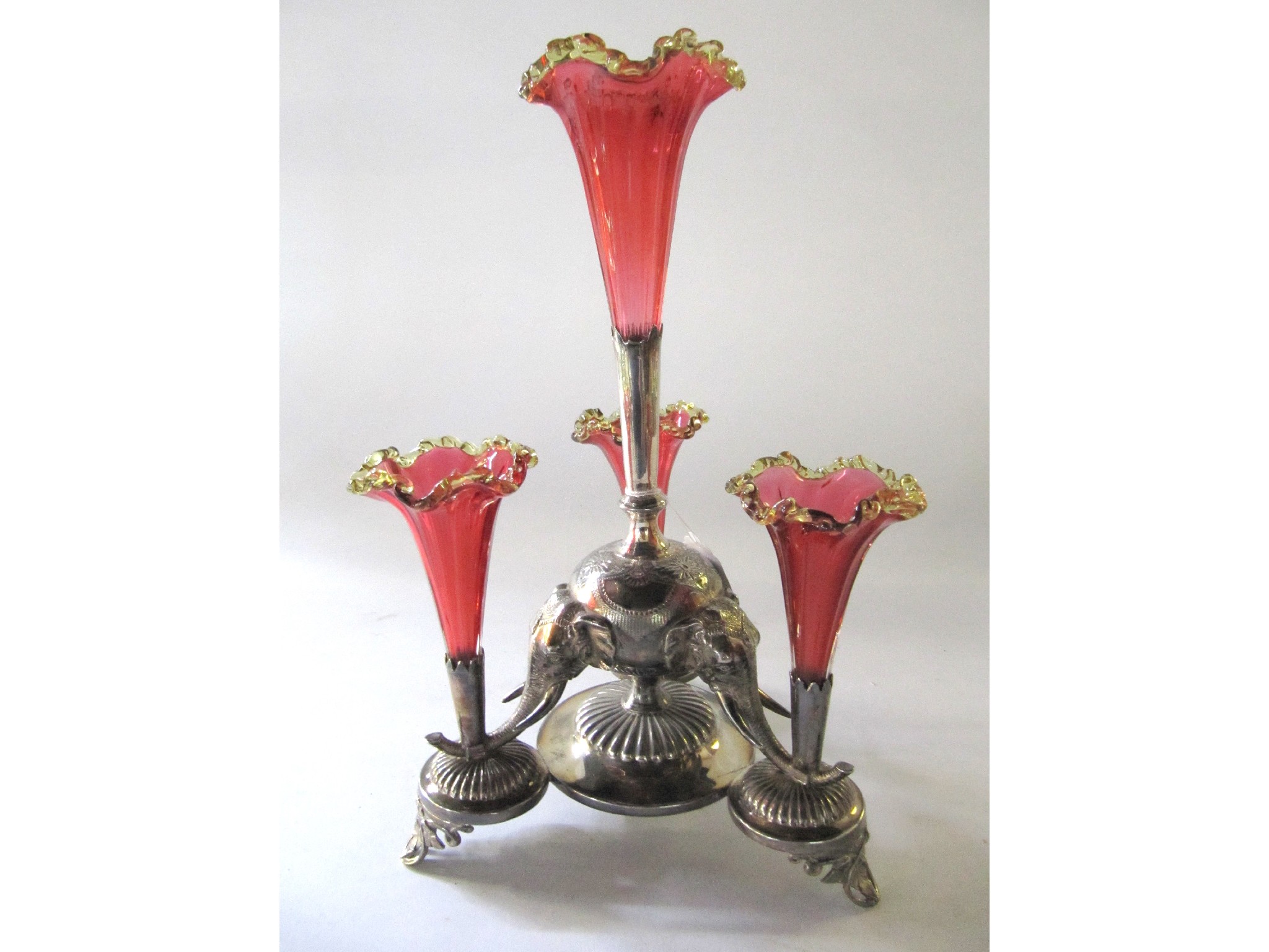 Appraisal: A silver plate epergne modelled as three elephant's heads with