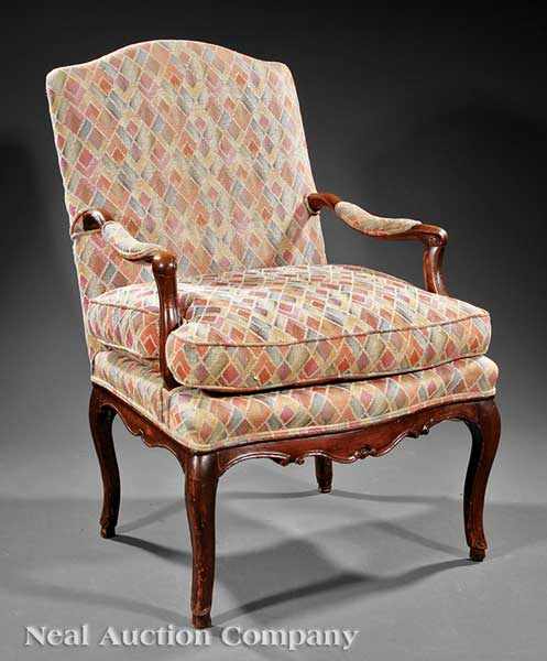 Appraisal: A Louis XV Provincial Carved Walnut Fauteuil la Reine mid-