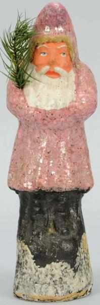 Appraisal: Paper Mache Belsnickle with Pink Coat Holding fir tree Condition