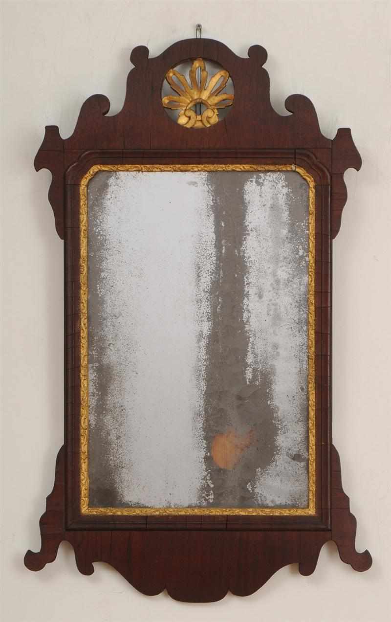 Appraisal: AMERICAN CHIPPENDALE STYLE CARVED MAHOGANY AND PARCEL-GILT MIRROR The plate