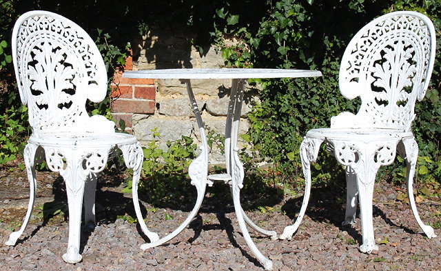 Appraisal: A WHITE PAINTED CAST ALUMINIUM CIRCULAR GARDEN TABLE with pierced