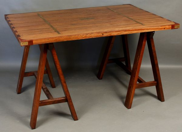 Appraisal: Solid mahogany brass-bound table top and base having brass plaque