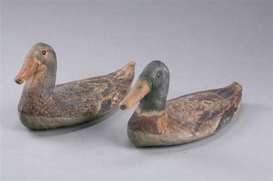 Appraisal: PAIR OF DECOYS American th century printed canvas Mallard drake