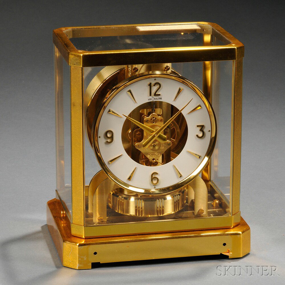 Appraisal: Atmos Brass and Glass Clock by Le Coultre Switzerland round