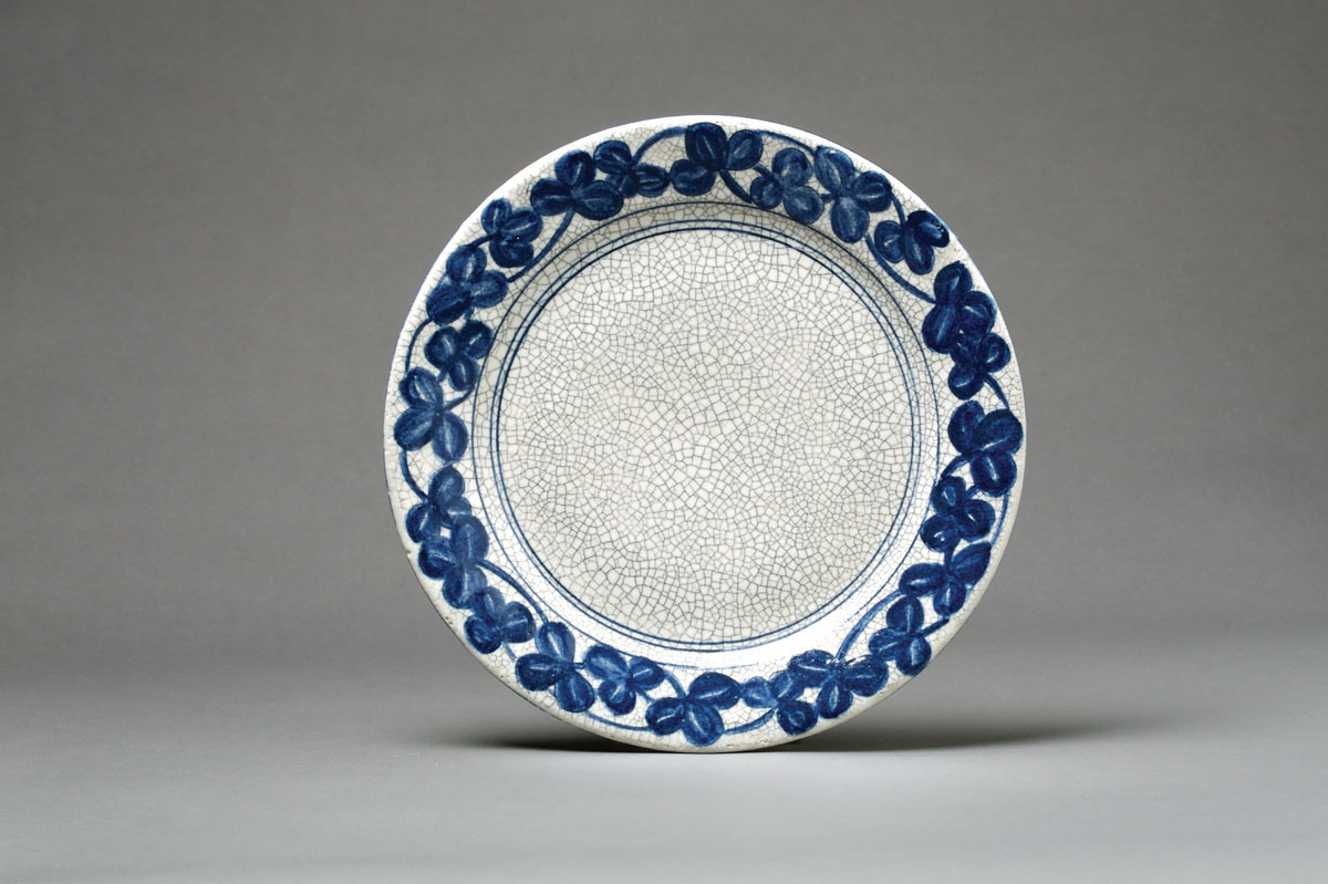 Appraisal: DEDHAM POTTERY 'CLOVER' PATTERN PLATE Painted in dark blue with