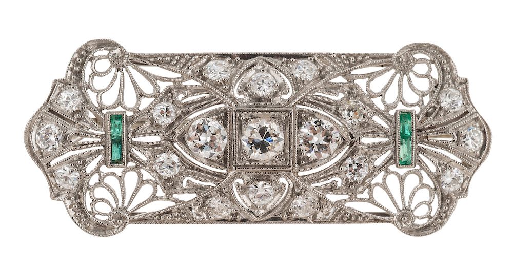 Appraisal: AN ART DECO SILVER DIAMOND AND EMERALD BROOCH AN ART