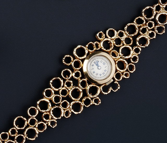 Appraisal: A LADY'S CT GOLD BRACELET WATCH BY JOHN DONALD the