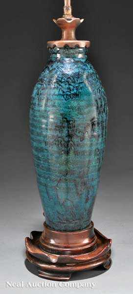 Appraisal: A Chinese Turquoise Glazed Cizhou Pottery Vase Ming Dynasty -