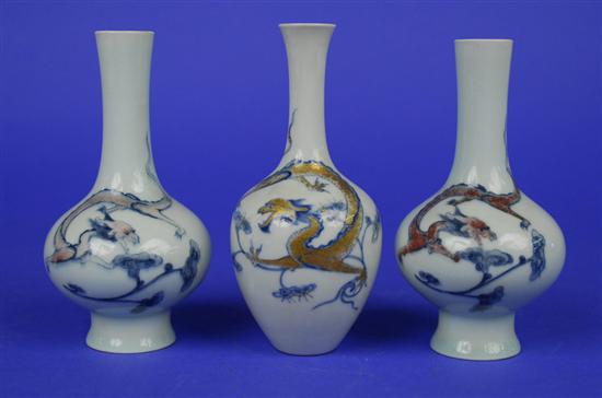 Appraisal: PAIR OF CHINESE DRAGON DECORATED BOTTLE FORM VASES bears Yong