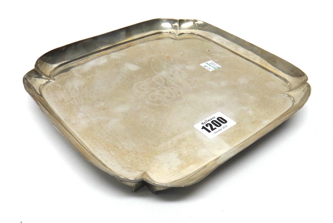 Appraisal: A silver shaped square salver raised on four corner feet