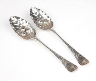 Appraisal: A pair of George II sterling silver repousse spoons -