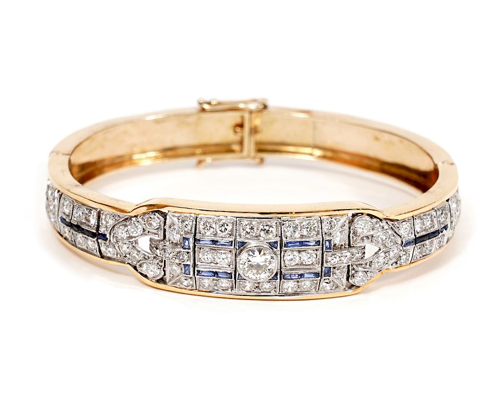 Appraisal: Yellow Gold Diamond Sapphire Hinged Bracelet Art Deco style diamond