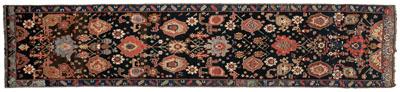 Appraisal: Karabagh runner repeating floral and rectilinear designs on ground of