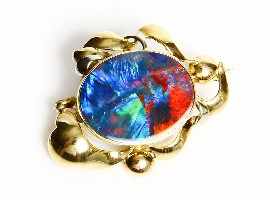 Appraisal: A ct gold opal doublet brooch approximately x mm gms