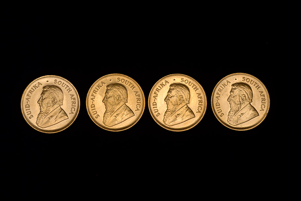 Appraisal: FOUR SOUTH AFRICAN GOLD KRUGERRANDS Three and one Condition oz