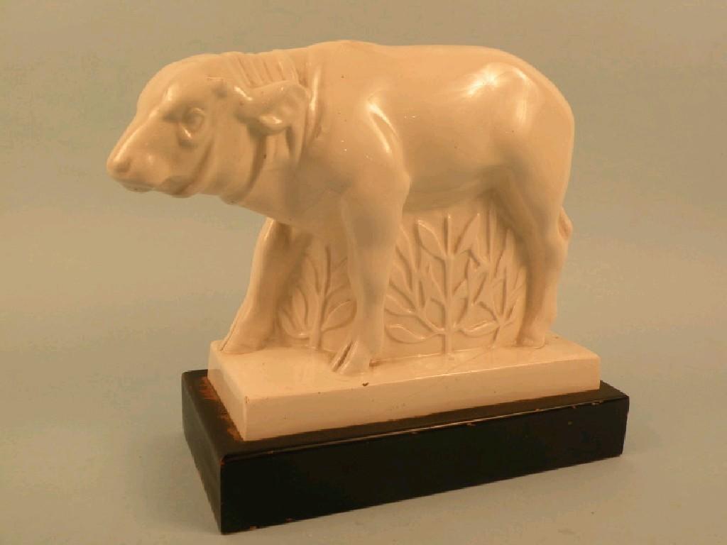 Appraisal: John Skeaping a Wedgwood cream glazed figure of a bison