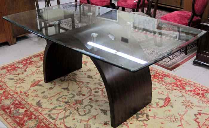 Appraisal: A CONTEMPORARY GLASS-TOP DINING TABLE O-Palier Furniture Co Williamsburg Ontario