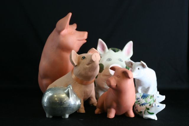 Appraisal: A Mekola Pinxt pig toy together with assorted pigs in