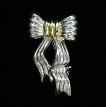 Appraisal: Tiffany Co Sterling Silver and Gold Bow Pin Tiffany sterling