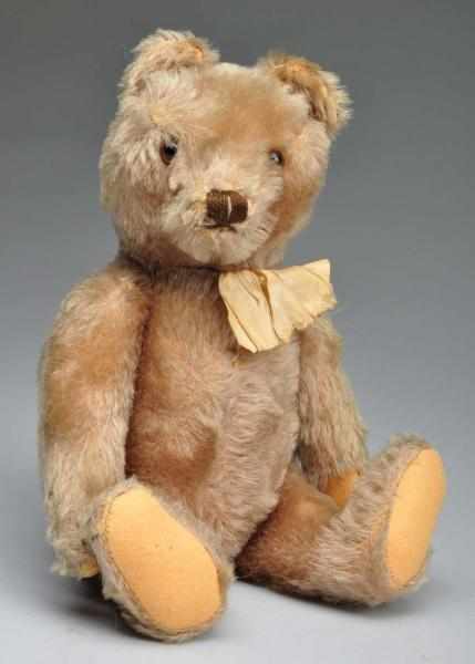 Appraisal: Steiff Jointed Bear Description Filled with straw No ear button