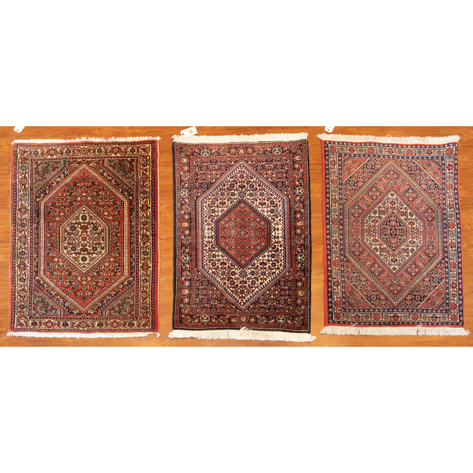 Appraisal: TRIO OF BIJAR RUGS PERSIA Fourth quarter- th century hand-knotted