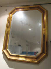 Appraisal: A large rectangular wall mirror with cut corners the shallow