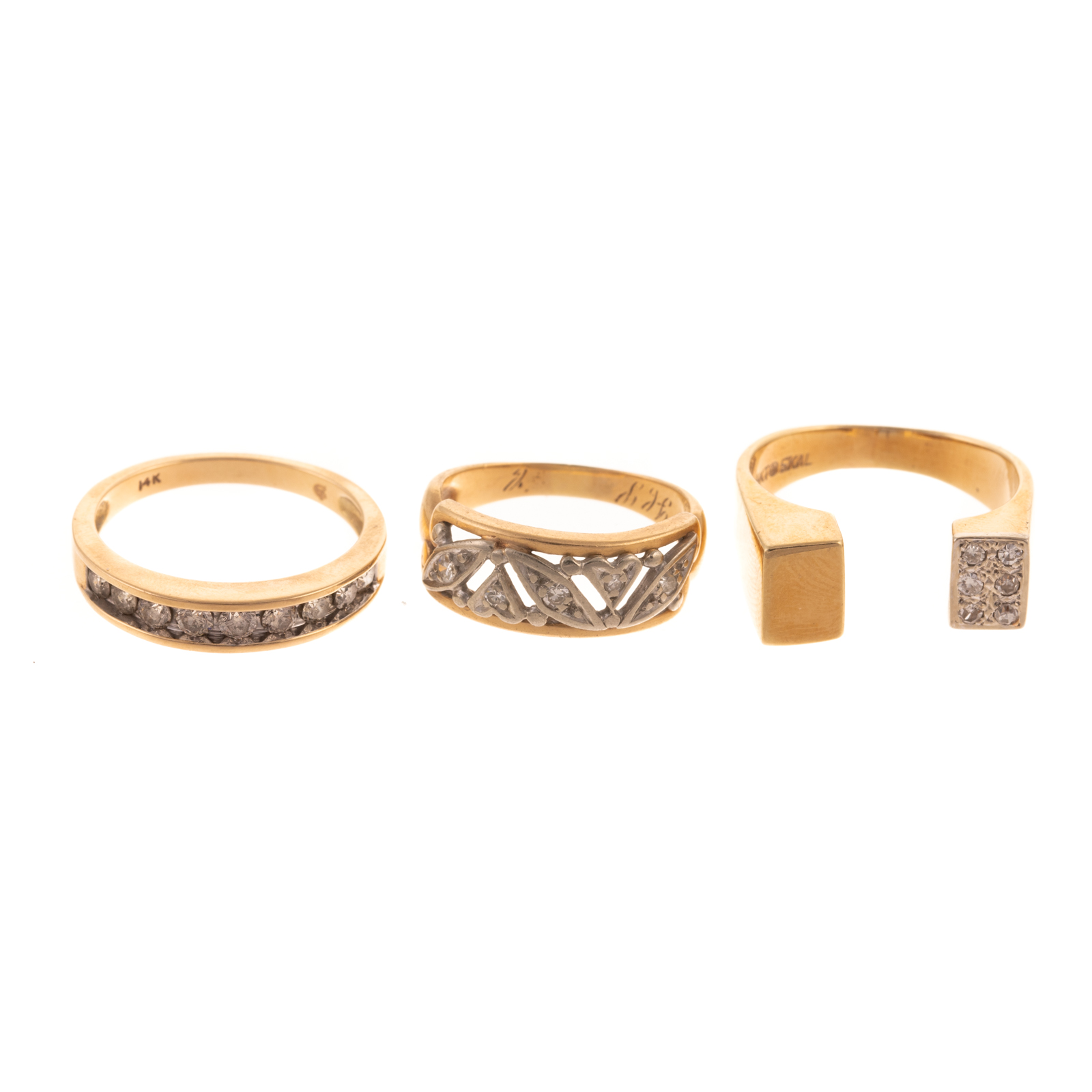 Appraisal: A TRIO OF DIAMOND RINGS IN K K yellow gold