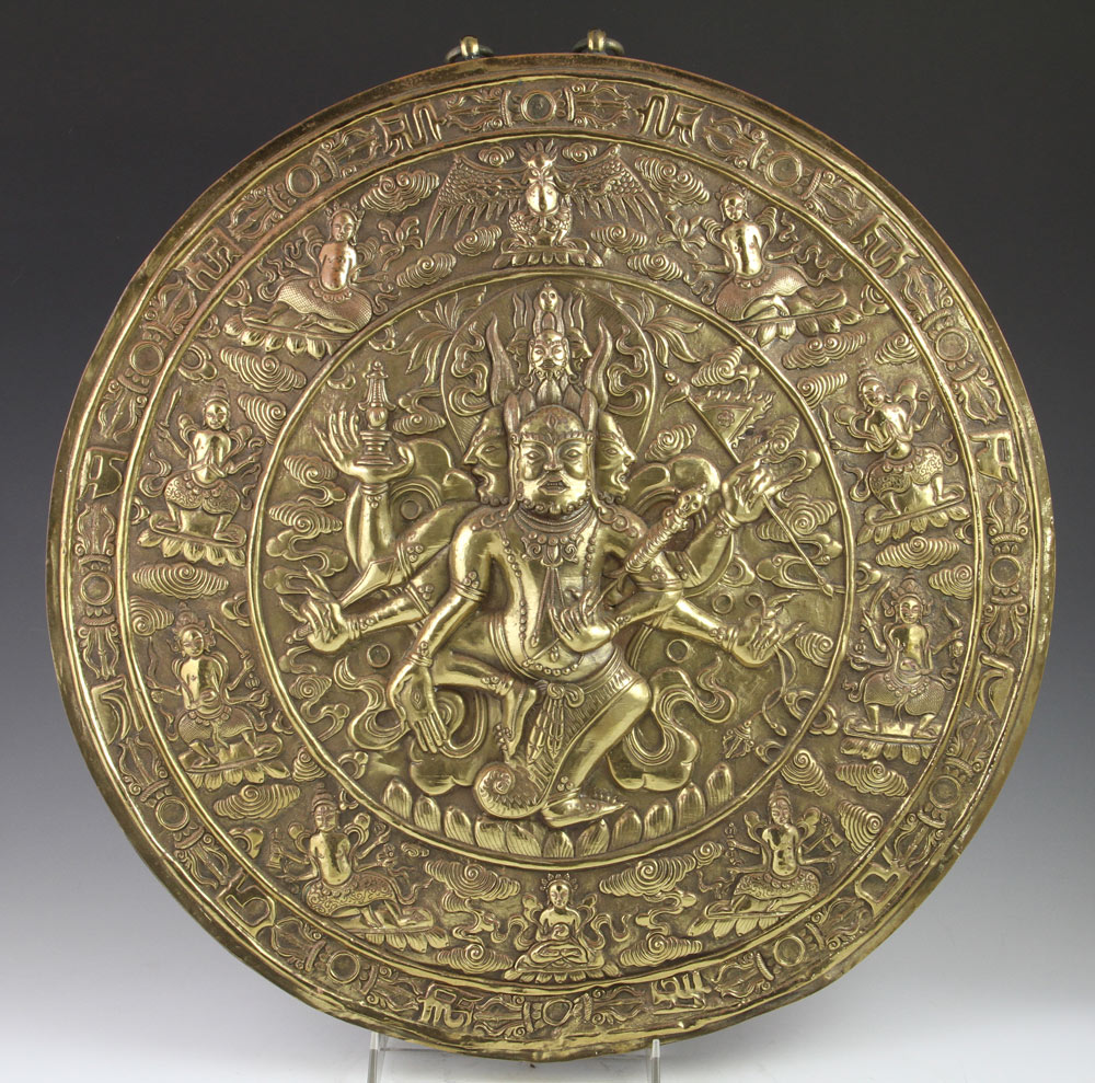 Appraisal: - Tibetan Wall Medallion Antique Tibetan brass embossed wall medallion